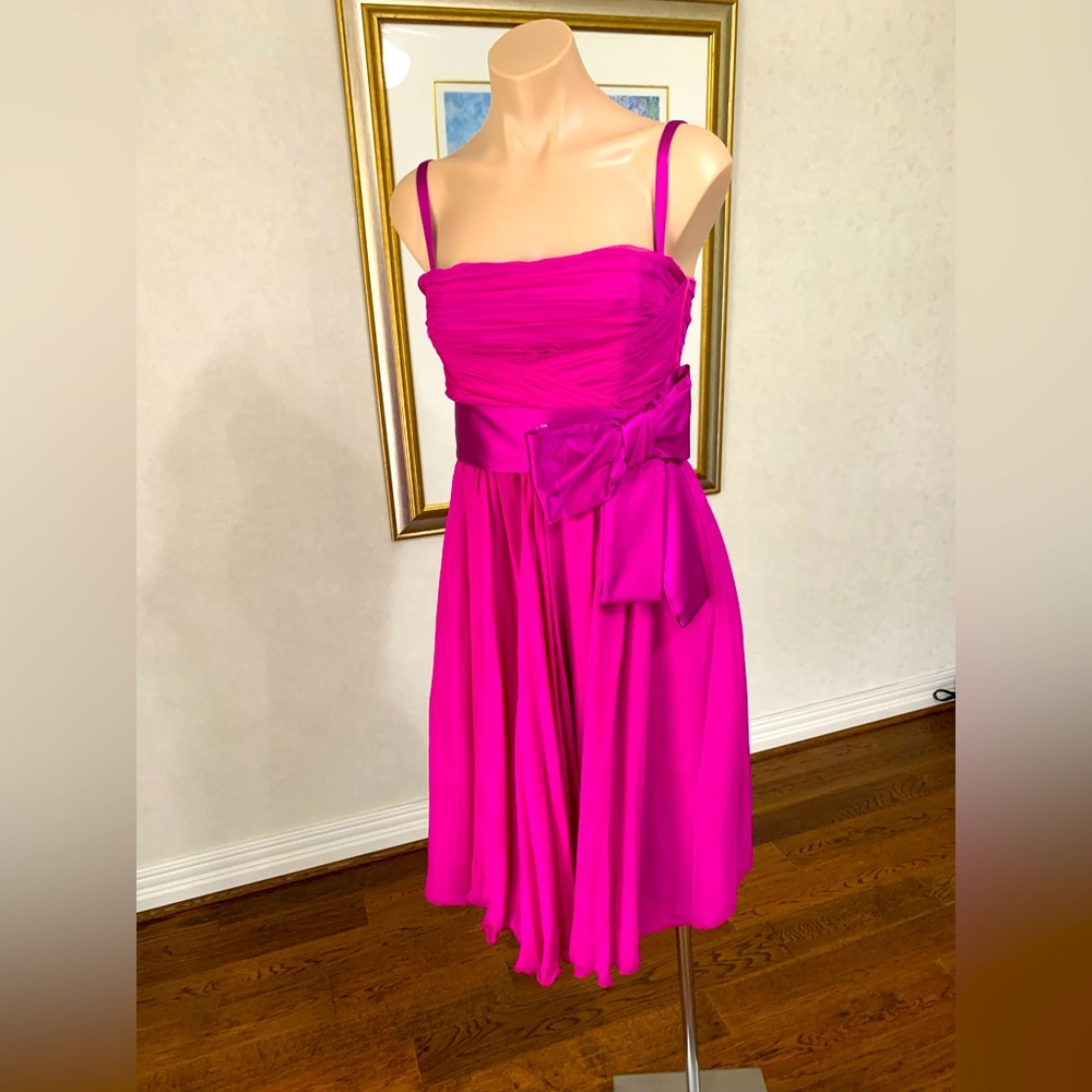Sweet and flowy Dolce & Gabanna fuchsia dress with bustier.